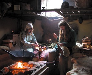 Working inside a Viking house. The Vikings were great craftsmen and fine examples of Viking crafts still survive from many sites.