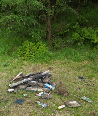 Typical camp fire surounded by rubbish on United Utilities section of land. Typical camp fire surounded by rubbish on United Utilities section of land.