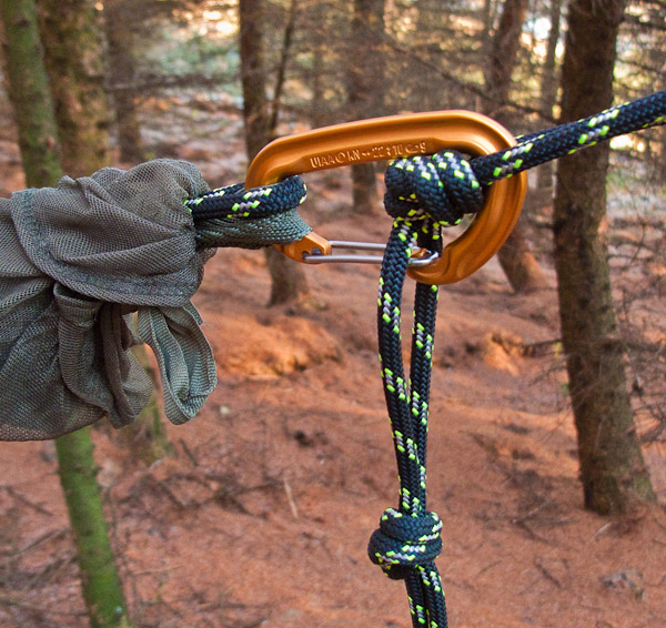 Slip the karabina through the loops  on both sides of the knot. If one loop should fail your hammock is still supported by the other. -  2017 - Gary Waidson - Ravenlore