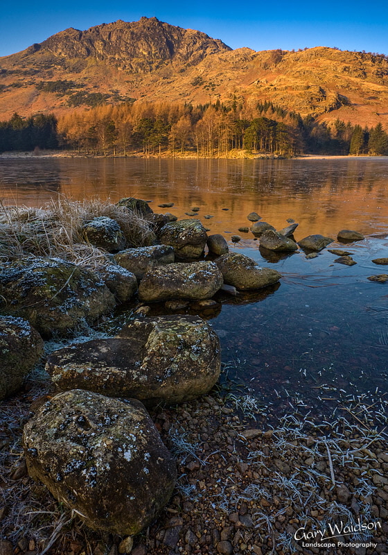 Blea Tarn under ice. Cumbria. Fine Art Landscape Photography by Gary Waidson